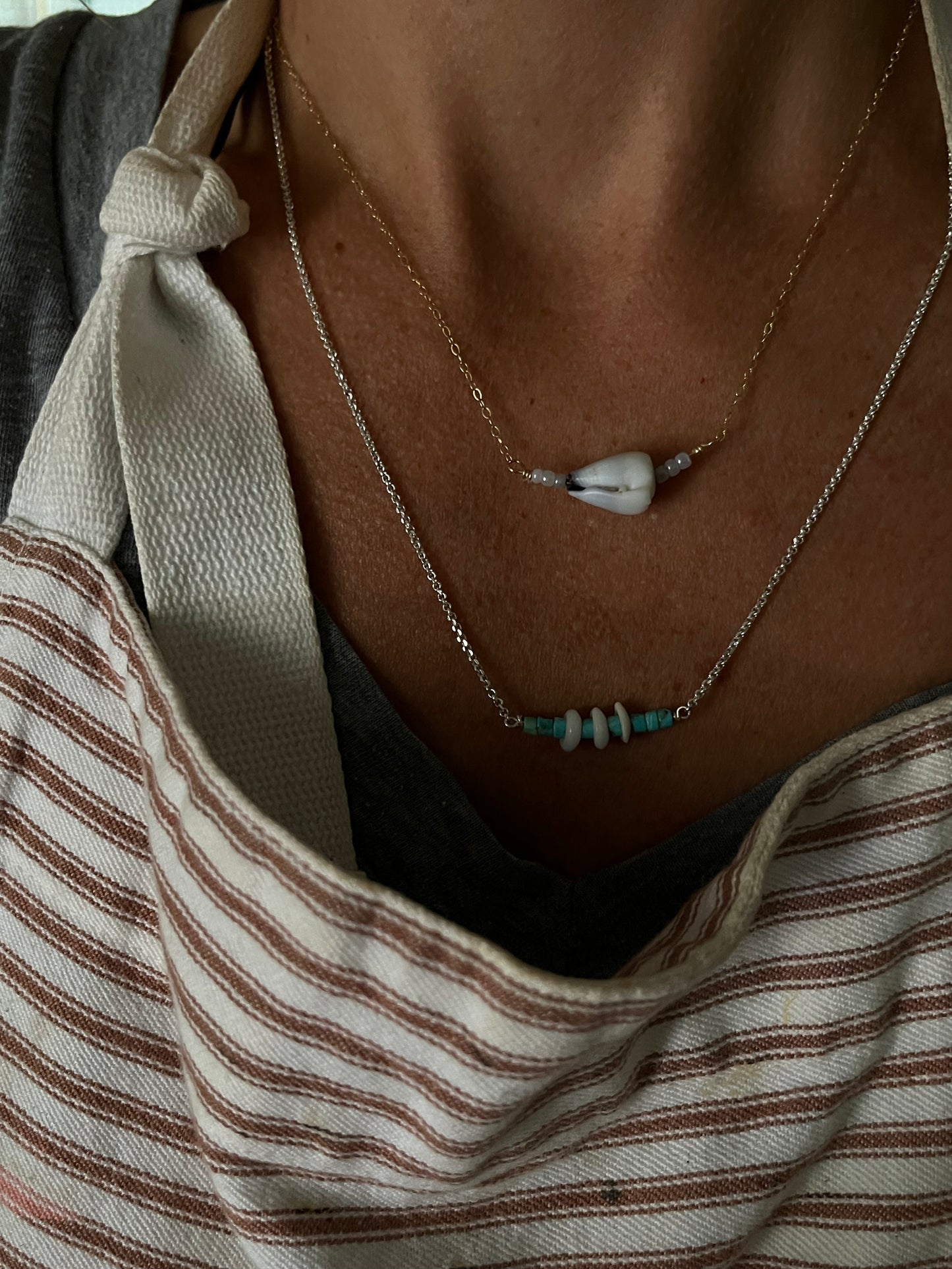 The Merchant Necklace in puka shell