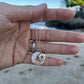 Puka Shell + Compass Rose Charm Necklace