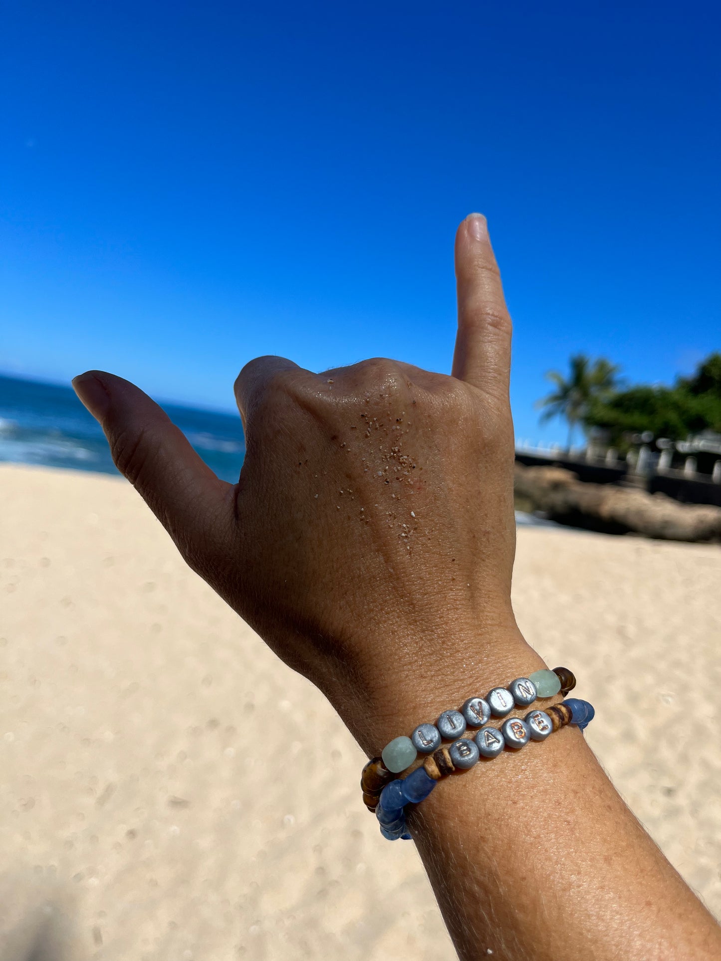 recycled sea glass + coconut word bracelet